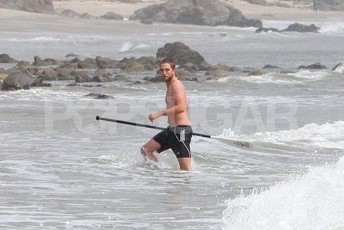 Robert Pattinson was shirtless in the water.
Robert Pattinson was shirtless in the water.