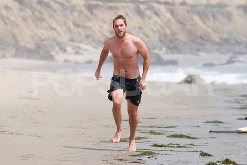Robert Pattinson went running shirtless on the beach.
Robert Pattinson went running shirtless on the beach.
