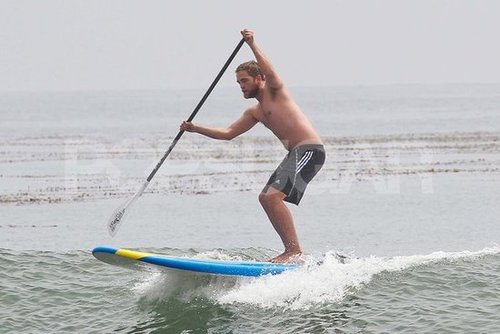 Robert Pattinson went paddleboarding shirtless.
Robert Pattinson went paddleboarding shirtless.
