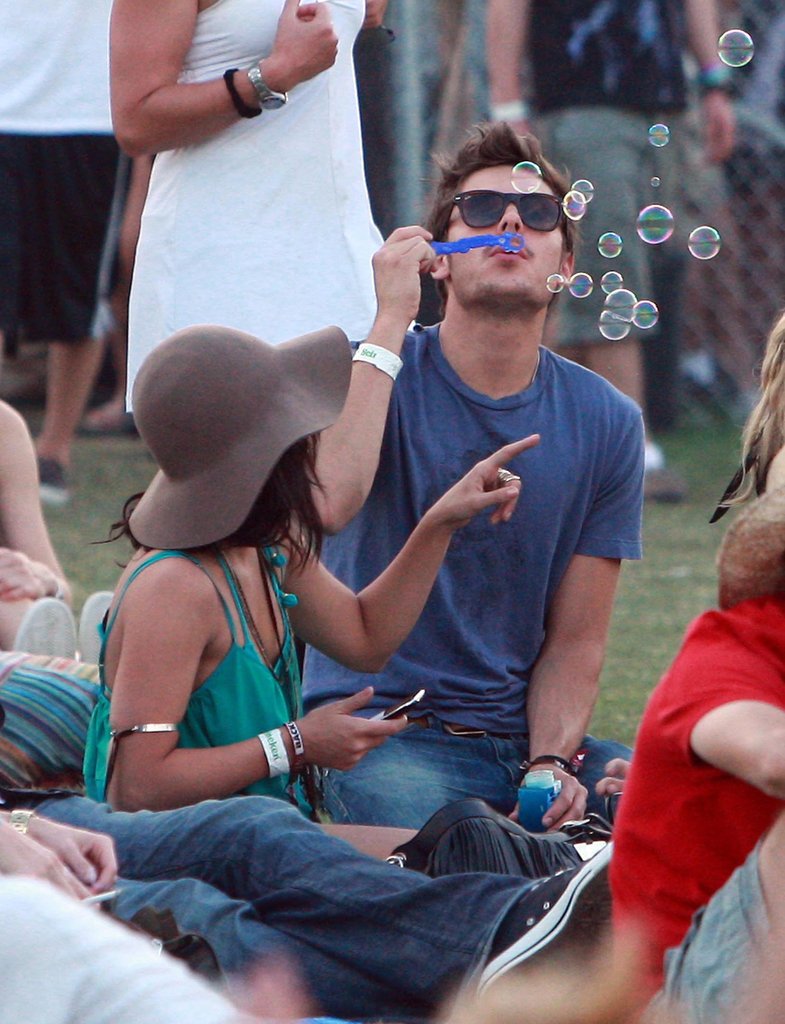 Zac Efron blew bubbles while Vanessa Hudgens watched on in 2010.
Zac Efron blew bubbles while Vanessa Hudgens watched on in 2010.