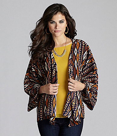 Instantly uplift a day or nighttime look with an exotic, African-esque print jacket. The open-front silhouette allows you to show off your outfit, and the billowing sleeves create a relaxed, flattering fit.
Gianni Bini Jordan Tribal-Print Jacket ($31)
Instantly uplift a day or nighttime look with an exotic, African-esque print jacket. The open-front silhouette allows you to show off your outfit, and the billowing sleeves create a relaxed, flattering fit.
Gianni Bini Jordan Tribal-Print Jacket ($31)