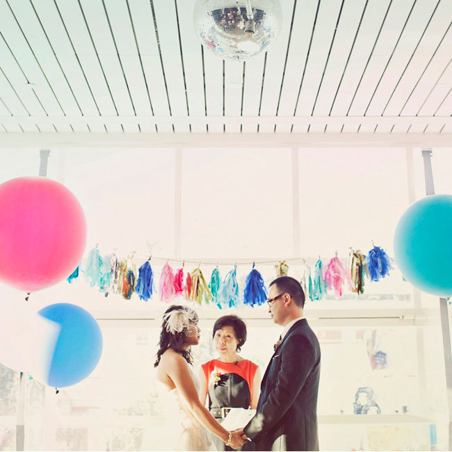 Bring a bit of personality to your ceremony with bright, punchy garland and big, oversize balloons.
Photo by Heidi Geldhauser of Our Labor of Love via Green Wedding Shoes
Bring a bit of personality to your ceremony with bright, punchy garland and big, oversize balloons.
Photo by Heidi Geldhauser of Our Labor of Love via Green Wedding Shoes