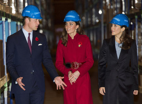 Prince William, Kate Middleton (in a pretty red long coat), and the Crown Princess Mary of Denmark visited the UNICEF emergency supply center in Copenhagen during November 2011.
Prince William, Kate Middleton (in a pretty red long coat), and the Crown Princess Mary of Denmark visited the UNICEF emergency supply center in Copenhagen during November 2011.