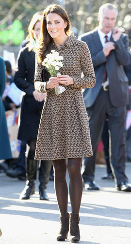 The Duchess of Cambridge arrived at Rose Hill Primary School during a visit to Oxford, England, in February 2012. For the occasion, she donned a pretty printed brown dress with brown tights and dark brown suede booties.
The Duchess of Cambridge arrived at Rose Hill Primary School during a visit to Oxford, England, in February 2012. For the occasion, she donned a pretty printed brown dress with brown tights and dark brown suede booties.