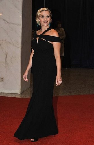 Reese Witherspoon posed for photos in a long black dress.
Reese Witherspoon posed for photos in a long black dress.
