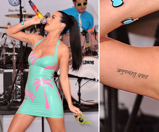 Katy Perry and Russell Brand got matching tattoos on their inner arm in 2010. It means "go with the flow" in Sanskrit.
Katy Perry and Russell Brand got matching tattoos on their inner arm in 2010. It means "go with the flow" in Sanskrit.