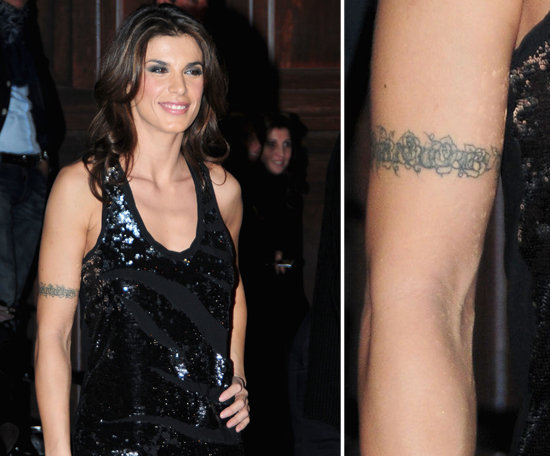 Elisabetta Canalis, George Clooney's former love, got an "Eminem" tattoo around her bicep in 2001 — she wanted one just like Em himself had! She covered up the rapper's name with a rose barbed wire design since then.
Elisabetta Canalis, George Clooney's former love, got an "Eminem" tattoo around her bicep in 2001 — she wanted one just like Em himself had! She covered up the rapper's name with a rose barbed wire design since then.
