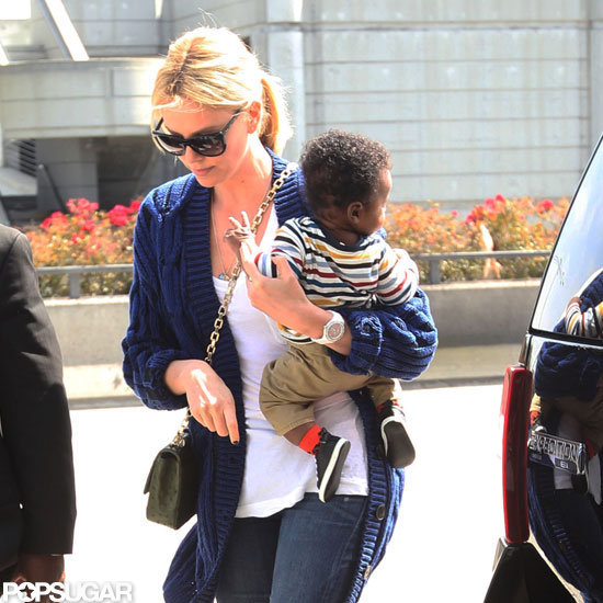Charlize Theron traveled from the airport in LA with son Jackson.
Charlize Theron traveled from the airport in LA with son Jackson.