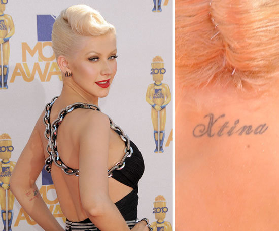 Christina Aguilera has her nickname "Xtina" inked on the back of her neck.
Christina Aguilera has her nickname "Xtina" inked on the back of her neck.