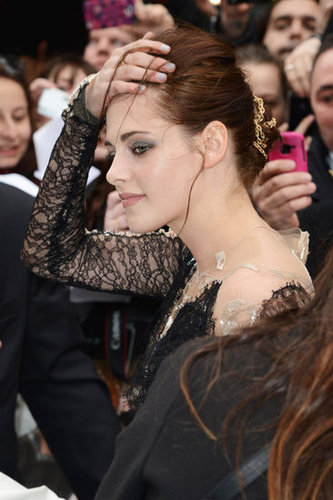 Her up-do showcased her smoky eye makeup — we also get a look at the gold rope strung through her hair.
Her up-do showcased her smoky eye makeup — we also get a look at the gold rope strung through her hair.