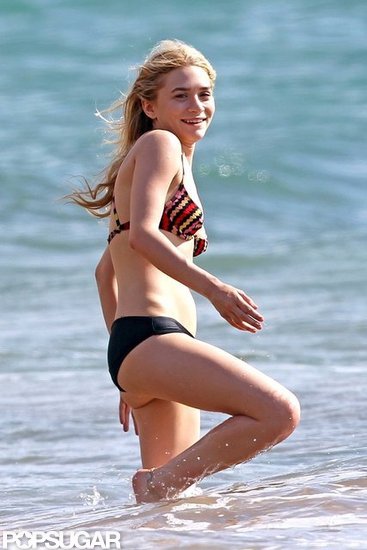 Ashley Olsen flashed a smile while walking through the waves in Maui, Hawaii.
Ashley Olsen flashed a smile while walking through the waves in Maui, Hawaii.