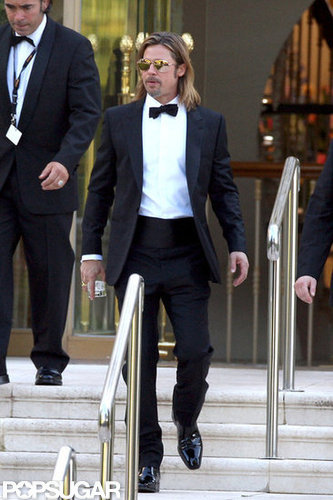 Brad Pitt carried a drink outside the Eden Roc hotel in Cannes in May.
Brad Pitt carried a drink outside the Eden Roc hotel in Cannes in May.
