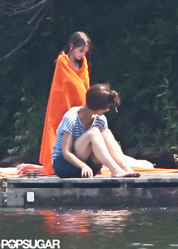 Suri Cruise and Katie Holmes dried themselves off after taking a dip in a pond in Kent, CT.
Suri Cruise and Katie Holmes dried themselves off after taking a dip in a pond in Kent, CT.