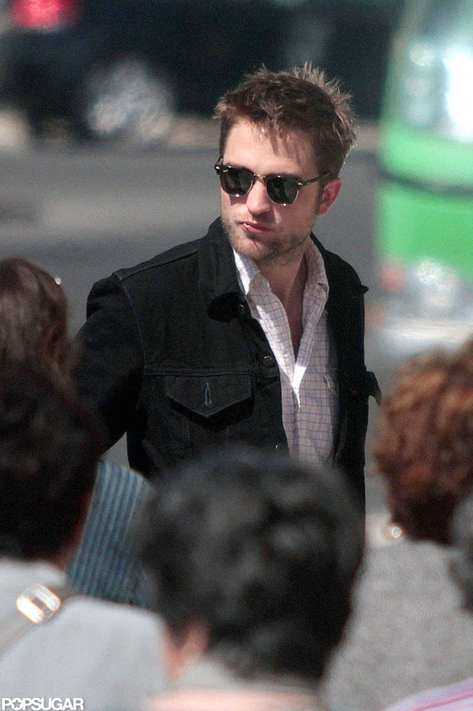 Robert Pattinson wore dark sunglasses in Lisbon. Robert Pattinson wore dark sunglasses in Lisbon.