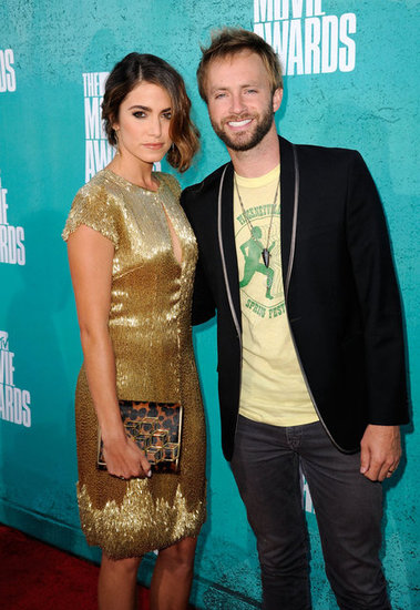 Nikki Reed posed with her husband Paul McDonald on the red carpet at the MTV Movie Awards.
Nikki Reed posed with her husband Paul McDonald on the red carpet at the MTV Movie Awards.