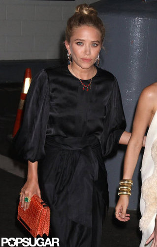 Mary-Kate Olsen wore a black silk dress with an orange clutch for the Fresh Air Fund's Spring Gala in NYC.
Mary-Kate Olsen wore a black silk dress with an orange clutch for the Fresh Air Fund's Spring Gala in NYC.