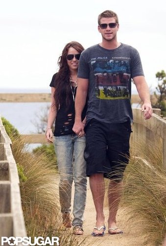 Miley Cyrus and Liam Hemsworth were hand in hand on the beach in Australia in January 2010.
Miley Cyrus and Liam Hemsworth were hand in hand on the beach in Australia in January 2010.