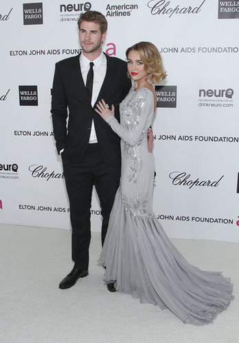 Miley Cyrus and Liam Hemsworth cuddled up at an Academy Awards party in February 2012.
Miley Cyrus and Liam Hemsworth cuddled up at an Academy Awards party in February 2012.