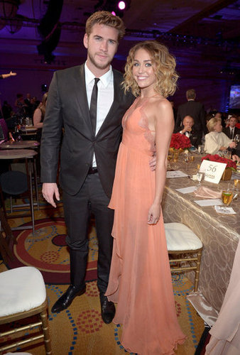 Miley Cyrus and Liam Hemsworth stuck together at Muhammad Ali's Celebrity Fight Night in March 2012.
Miley Cyrus and Liam Hemsworth stuck together at Muhammad Ali's Celebrity Fight Night in March 2012.