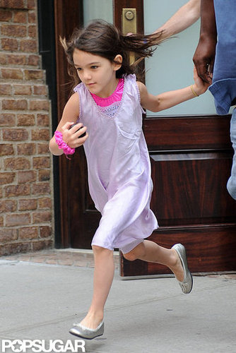 Suri Cruise was on the move as she ran to a car waiting for her.
Suri Cruise was on the move as she ran to a car waiting for her.