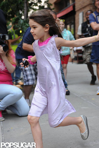 Suri Cruise ran in her silver flats for the car in NYC.
Suri Cruise ran in her silver flats for the car in NYC.