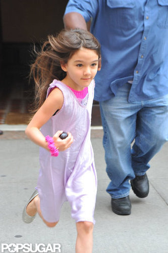 Suri Cruise ran for the car in NYC.
Suri Cruise ran for the car in NYC.