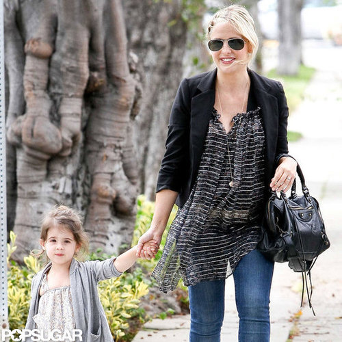 Sarah Michelle Gellar kept her baby bump disguised under a printed top.
Sarah Michelle Gellar kept her baby bump disguised under a printed top.