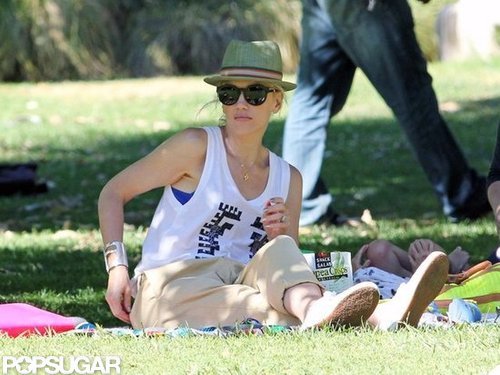 Gwen Stefani wore a hat and shades while sitting in an LA park.
Gwen Stefani wore a hat and shades while sitting in an LA park.
