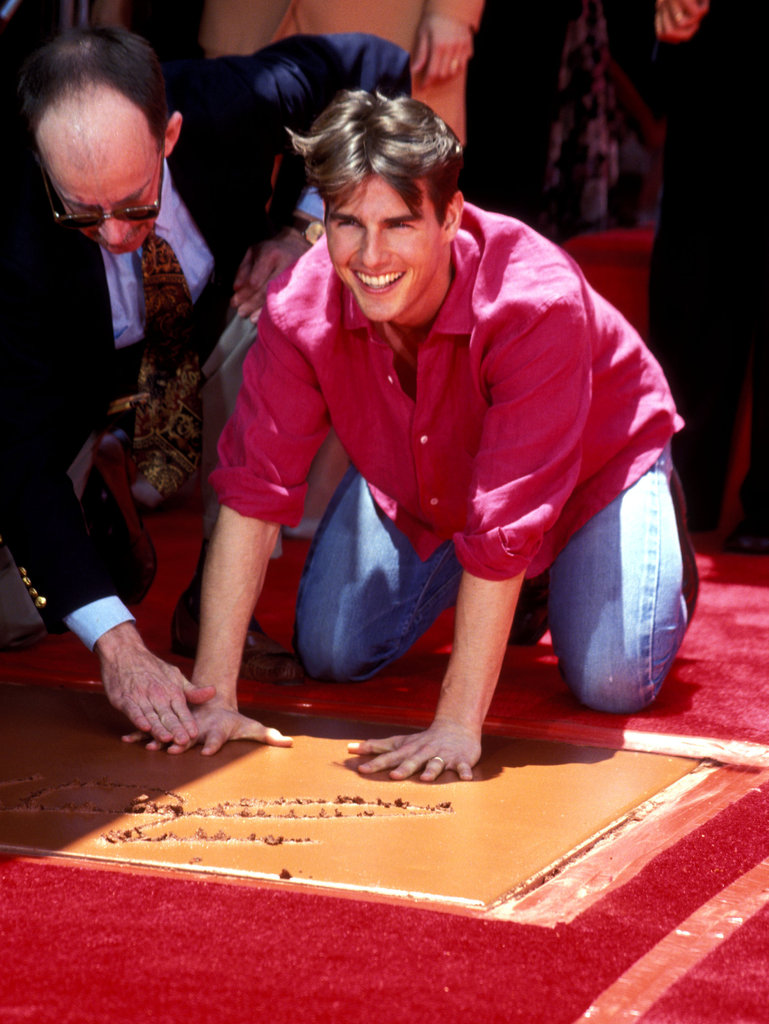 Tom Cruise smiled as he put his hands into the cement at Mann's Chinese Theatre in LA in June 1993.
Tom Cruise smiled as he put his hands into the cement at Mann's Chinese Theatre in LA in June 1993.