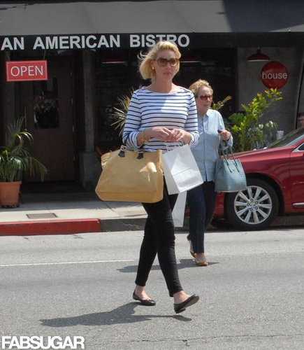 Katherine Heigl put the ultimate nautical spin on her Fendi Twins straw tote by pairing it with a striped boatneck top, skinny black pants, and ladylike flats.
7331161
Katherine Heigl put the ultimate nautical spin on her Fendi Twins straw tote by pairing it with a striped boatneck top, skinny black pants, and ladylike flats.
7331161