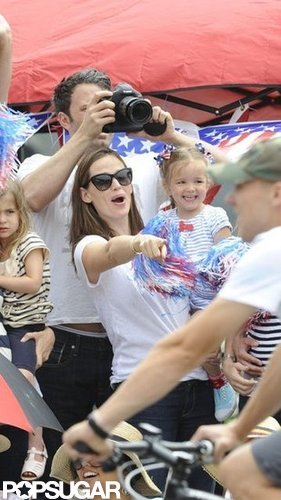 Ben Affleck and Jennifer Garner took Seraphina to watch Violet in a Pacific Palisades Fourth of July parade.
Ben Affleck and Jennifer Garner took Seraphina to watch Violet in a Pacific Palisades Fourth of July parade.