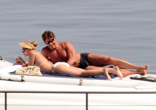 Scarlett Johansson got in some tanning in a white bikini while floating around Sicily in July 2012.
Scarlett Johansson got in some tanning in a white bikini while floating around Sicily in July 2012.