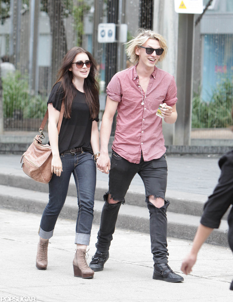 Jamie Campbell Bower and Lily Collins held hands in Toronto. Jamie Campbell Bower and Lily Collins held hands in Toronto.
