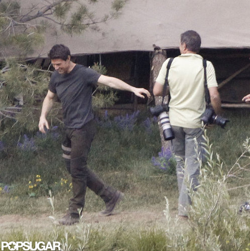 Tom Cruise left a conversation laughing on the set of Oblivion in June Lake, CA.
Tom Cruise left a conversation laughing on the set of Oblivion in June Lake, CA.