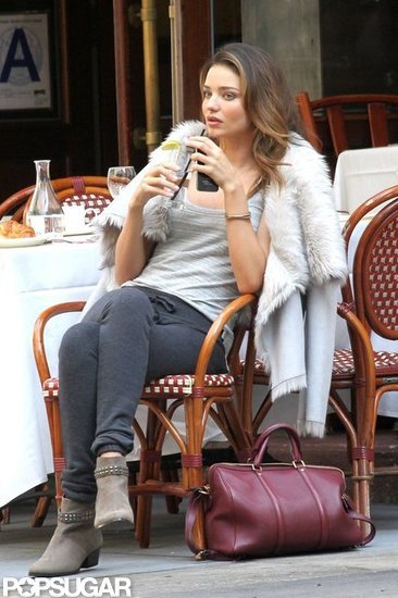 Miranda Kerr sipped a drink while shooting a Victoria's Secret campaign.
Miranda Kerr sipped a drink while shooting a Victoria's Secret campaign.