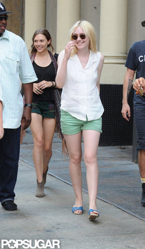 Dakota Fanning kept cool in a sleeveless button-down and green shorts.
Dakota Fanning kept cool in a sleeveless button-down and green shorts.