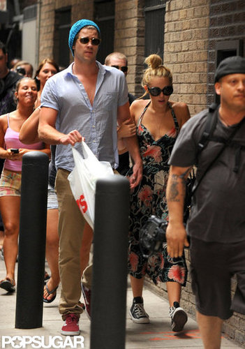 Miley Cyrus held onto Liam Hemsworth's arm while out and about in Philadelphia together in July 2012.
Miley Cyrus held onto Liam Hemsworth's arm while out and about in Philadelphia together in July 2012.
