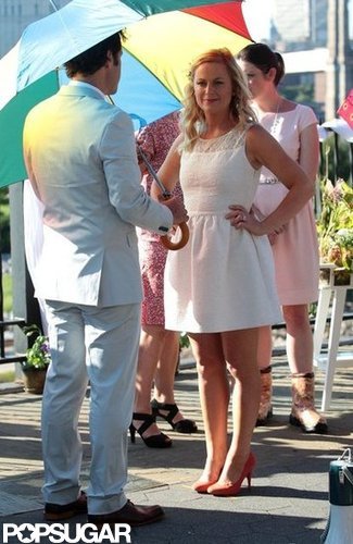Amy Poehler Gets Close With Pal Paul and Son Archie on Set Amy Poehler Gets Close With Pal Paul and Son Archie on Set