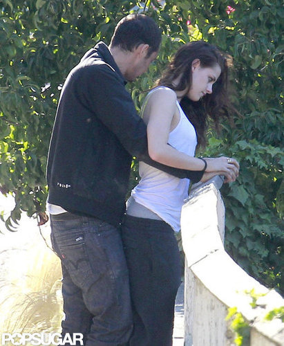 Rupert Sanders cuddled up to Kristen Stewart outside.
Rupert Sanders cuddled up to Kristen Stewart outside.