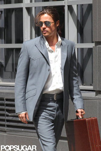 Brad Pitt Wears a Ponytail For a Working Weekend Brad Pitt Wears a Ponytail For a Working Weekend