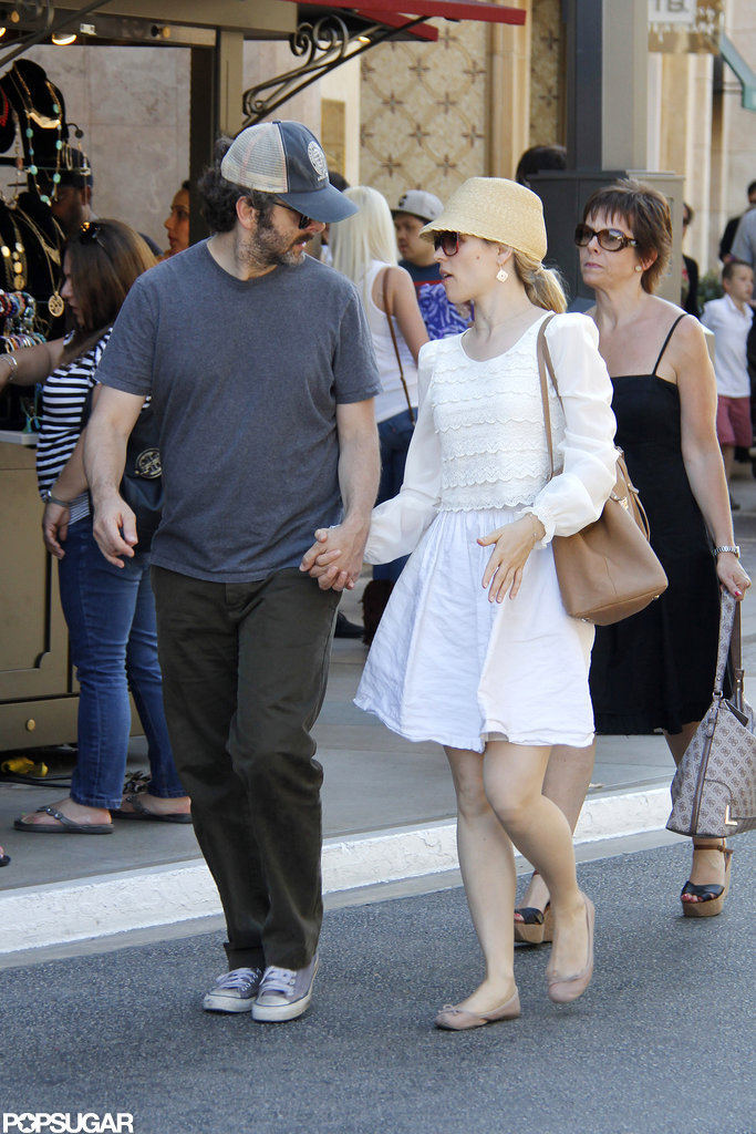 Rachel McAdams topped off her summery look with a straw fedora. Rachel McAdams topped off her summery look with a straw fedora.