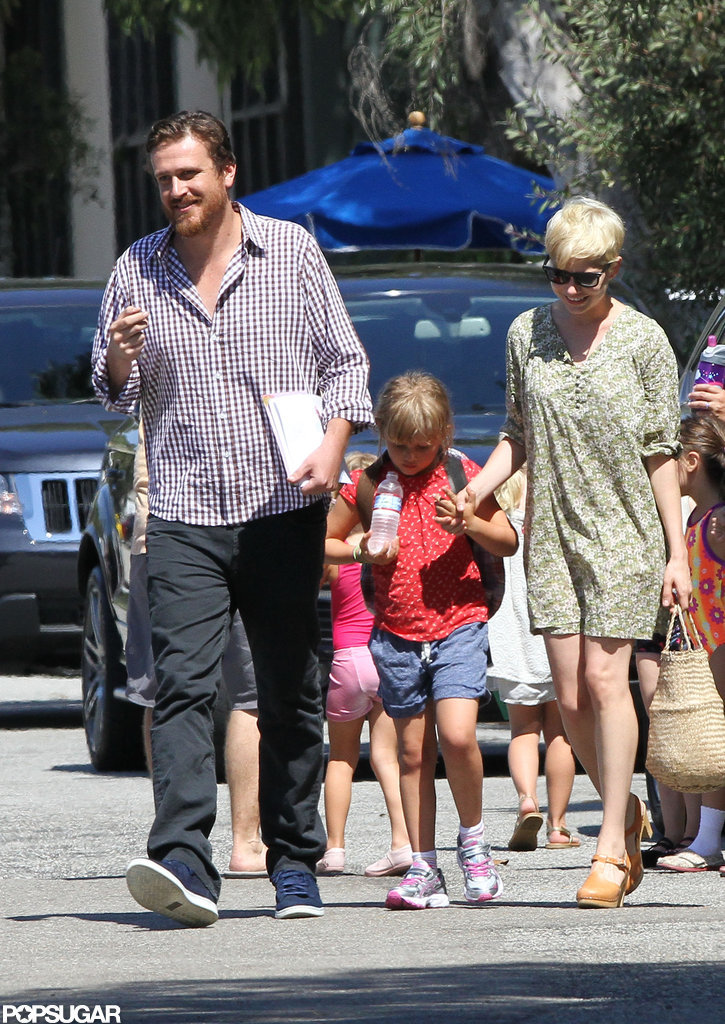 Michelle Williams took Matilda by the hand while taking a stroll with Jason Segel in LA. Michelle Williams took Matilda by the hand while taking a stroll with Jason Segel in LA.