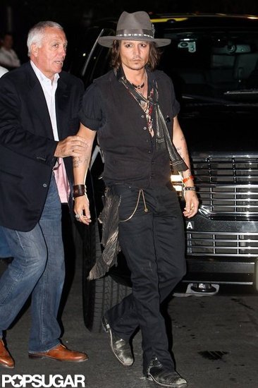 Johnny Depp smiled on the way into Aerosmith's afterparty in LA.
Johnny Depp smiled on the way into Aerosmith's afterparty in LA.