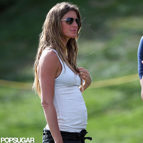 Pregnant Gisele Bundchen showed off her baby bump in a white tank.
Pregnant Gisele Bundchen showed off her baby bump in a white tank.