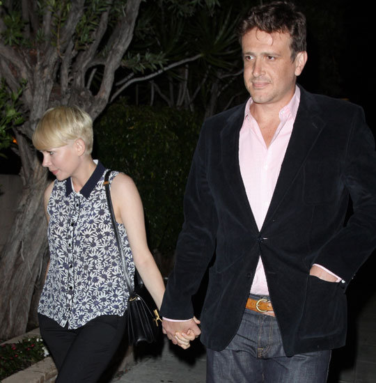 Michelle Williams held Jason Segel's hand during a date night.
Michelle Williams held Jason Segel's hand during a date night.