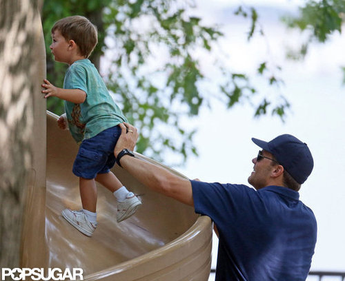 Tom Brady helped Benjamin run up the slide.
Tom Brady helped Benjamin run up the slide.