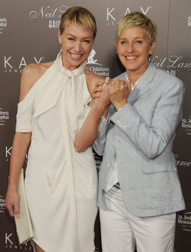 Ellen DeGeneres and Portia de Rossi showed off their wedding bands at a July 2010 event in LA.
Ellen DeGeneres and Portia de Rossi showed off their wedding bands at a July 2010 event in LA.