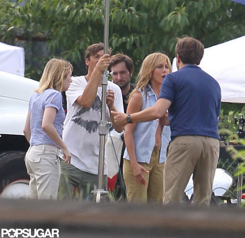 Jennifer Aniston Flashes Her Abs in a Bra on Set Jennifer Aniston Flashes Her Abs in a Bra on Set