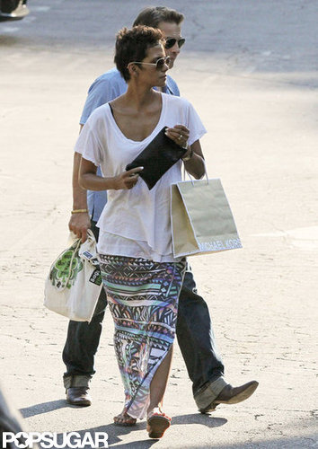 Halle Berry wore a maxi skirt with a slit while shopping with Olivier Martinez.
Halle Berry wore a maxi skirt with a slit while shopping with Olivier Martinez.