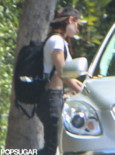 Kristen Stewart wore a backward hat.
Kristen Stewart wore a backward hat.